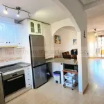 Venta de Espectacular Piso Bajo en Playa Islas Menores con Amplio Porche y Piscina Comunitaria 7