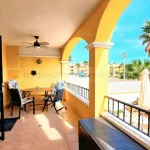 Venta de Espectacular Piso Bajo en Playa Islas Menores con Amplio Porche y Piscina Comunitaria 16