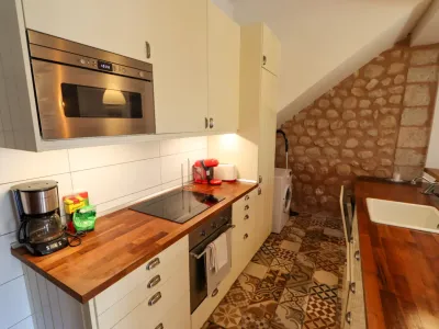 A two-apartment house on a quiet street, featuring a private pool