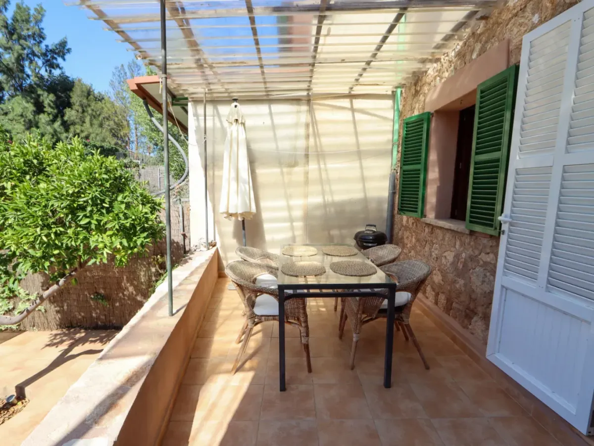 A two-apartment house on a quiet street, featuring a private pool