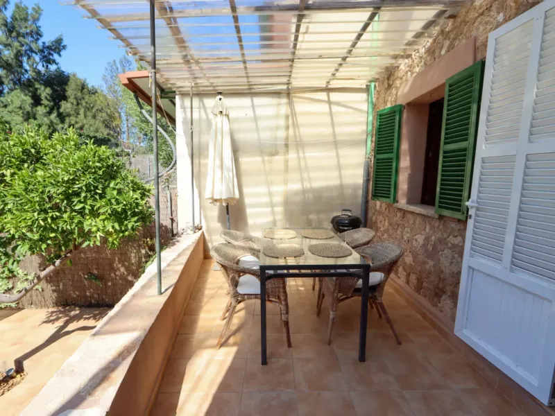 A two-apartment house on a quiet street, featuring a private pool