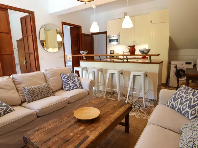 A two-apartment house on a quiet street, featuring a private pool