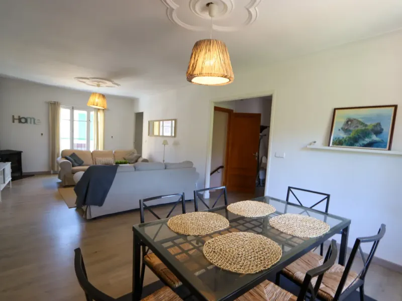 A two-apartment house on a quiet street, featuring a private pool