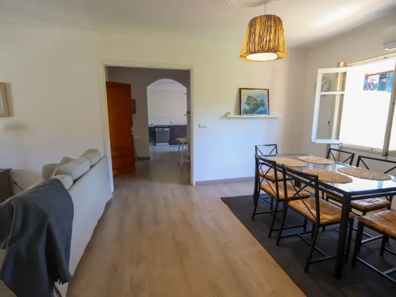 A two-apartment house on a quiet street, featuring a private pool