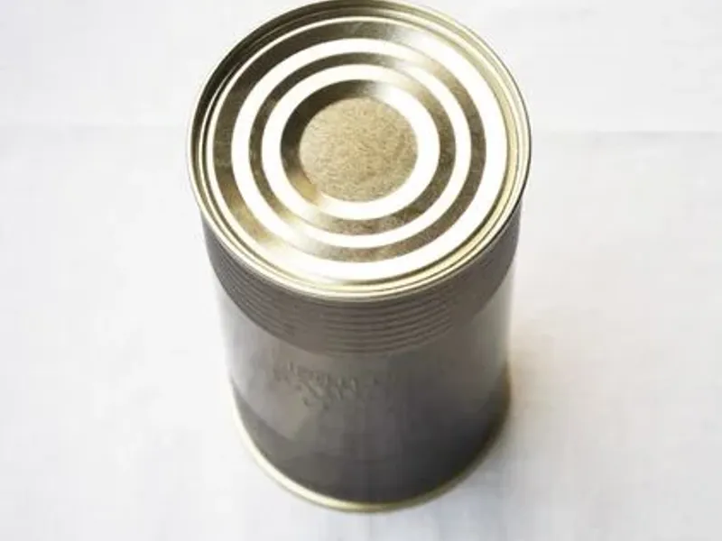 Lata de perfume “Le Male” de Jean Paul Gaultier