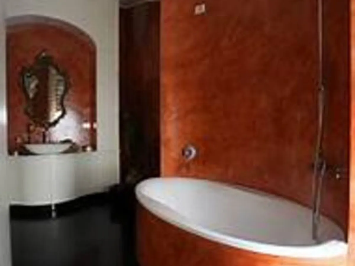 Aplicador de autonivelante.