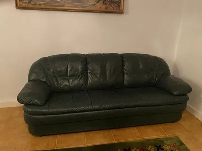 Sofás verdes em napa