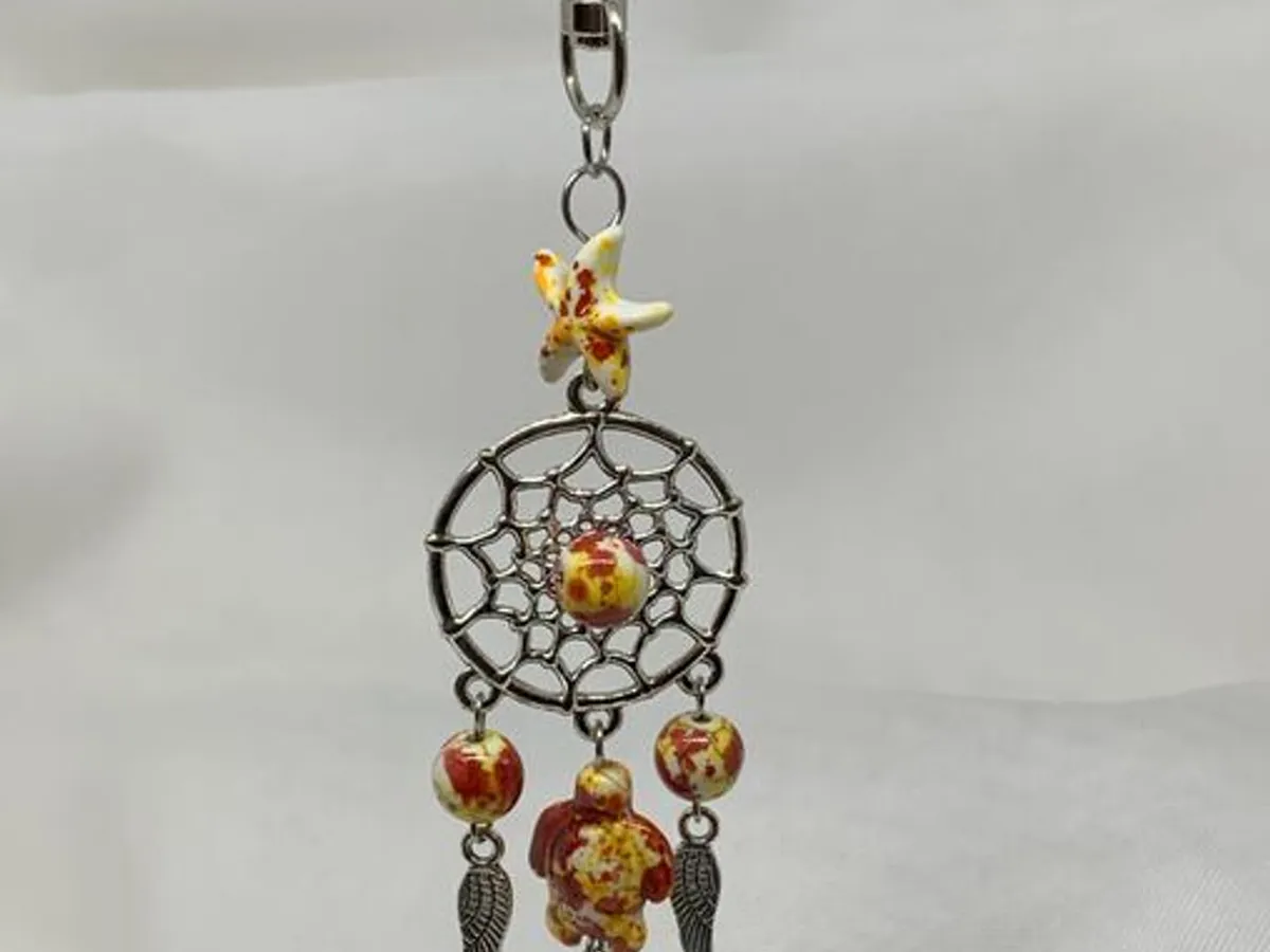 Porta-chaves c/ contas e tartaruga amarelo