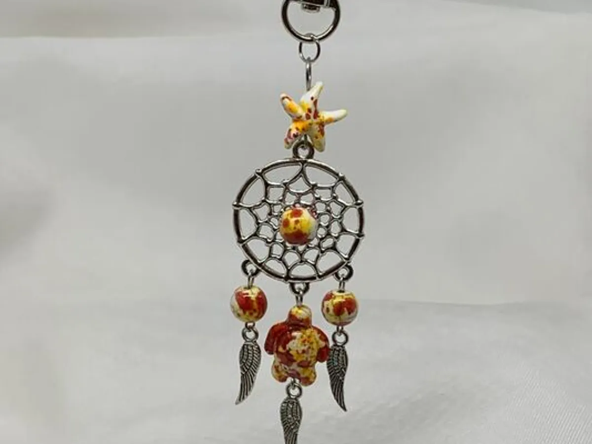 Porta-chaves c/ contas e tartaruga amarelo