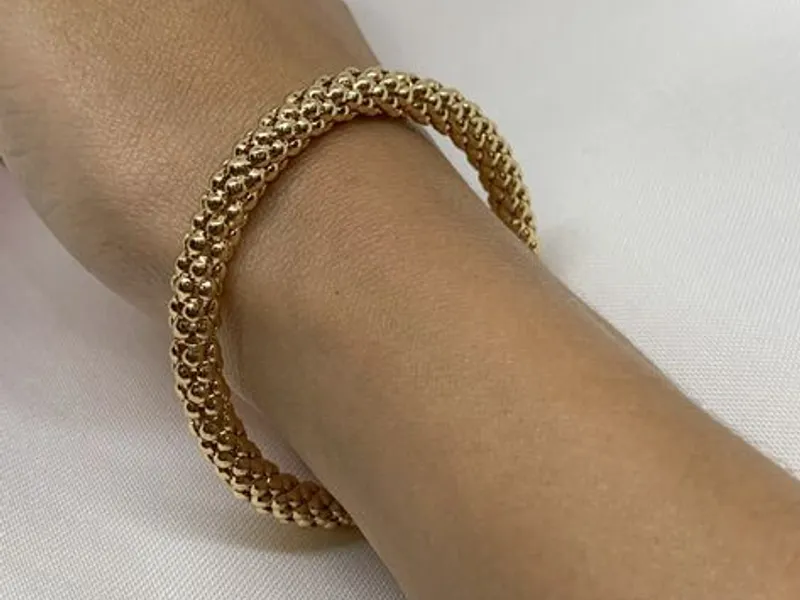 Pulseira Elástica Dourada com Efeito de Esferas - 