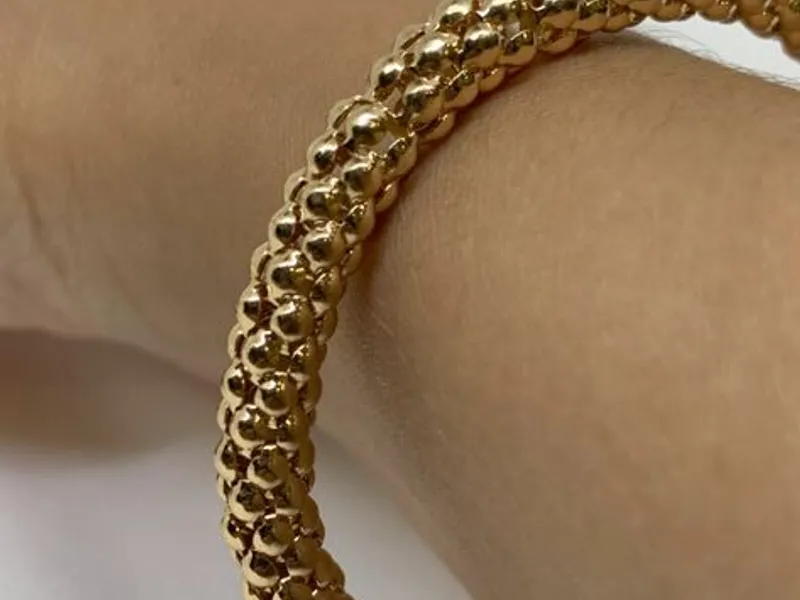 Pulseira Elástica Dourada com Efeito de Esferas - 