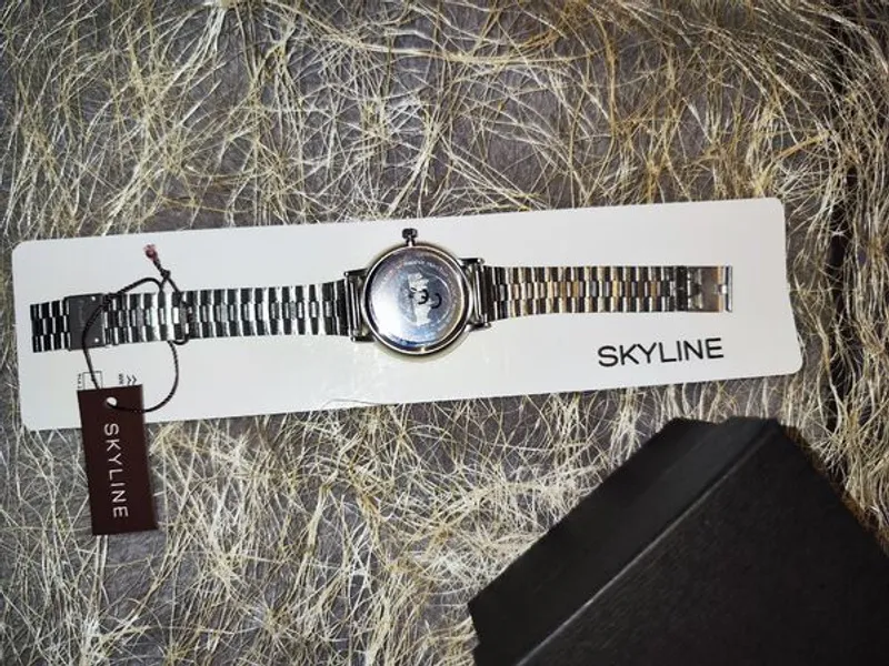 Relógio de pulso feminino prateado em aço Skyline 