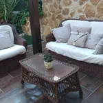 CONJUNTO TRESILLO DE MIMBRE CON MESA DE CRISTAL 1