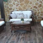 CONJUNTO TRESILLO DE MIMBRE CON MESA DE CRISTAL 2