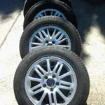 JUEGO LLANTAS VOLVO 15 CON GOMAS NUEVAS ORIGINALES 4